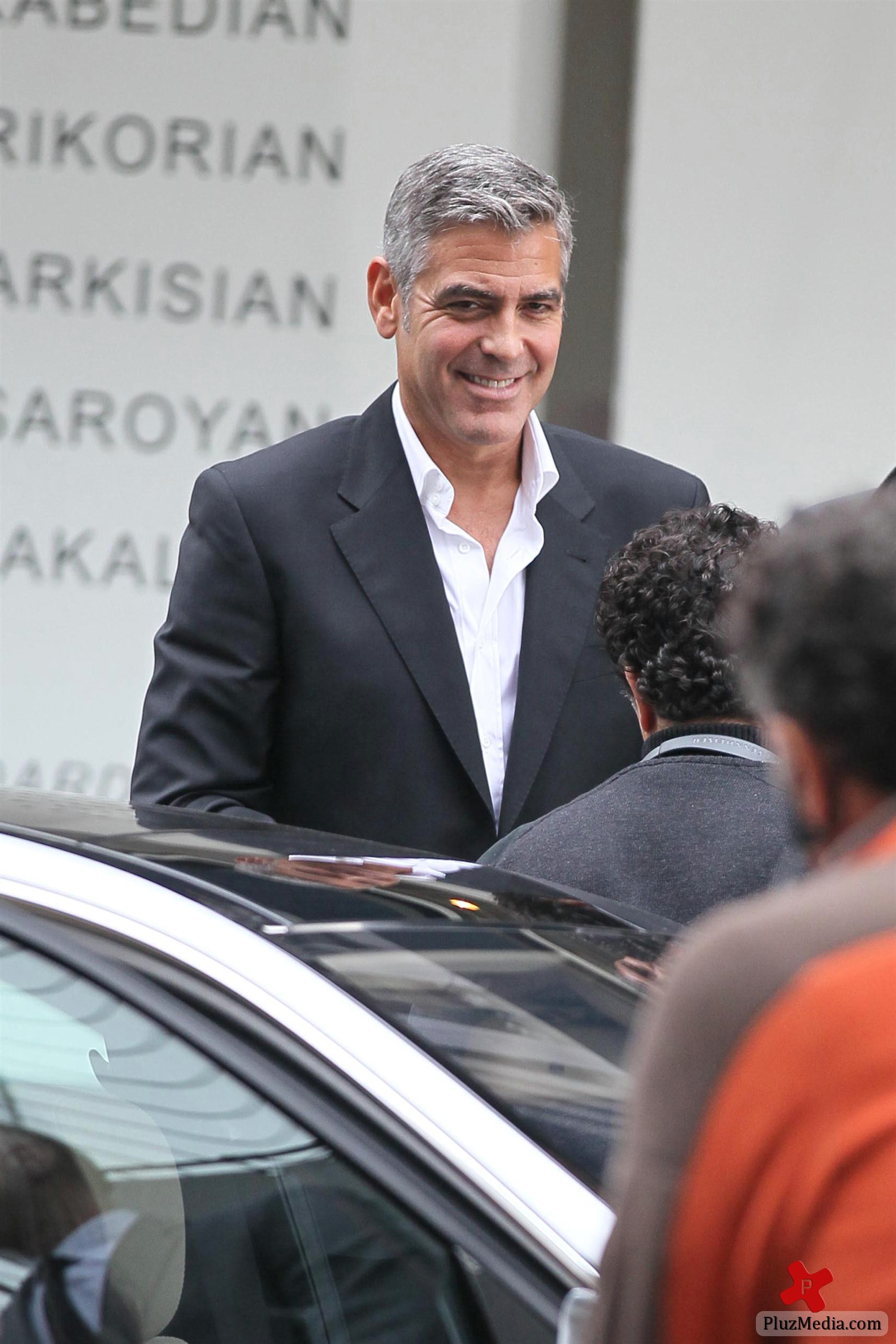 George Clooney on the set of a Mercedes Benz E300 L advert photos | Picture 78288